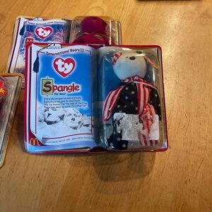 Ty  Beanie Baby Ronald McDonald house
 Millennium the Bear & Spangle the Bear